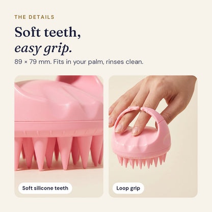 Close-up of the massager's soft silicone teeth beside a hand holding it by the loop grip